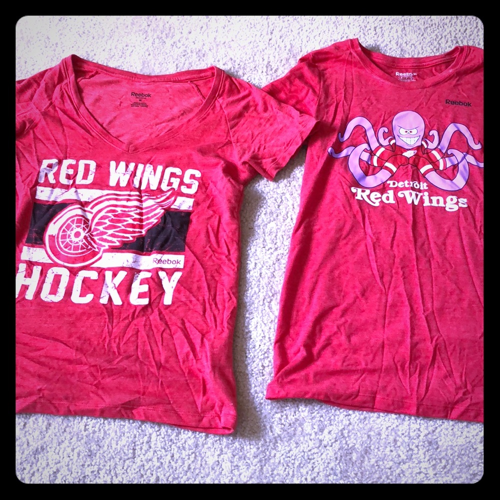 Two Reebok red wings shirts